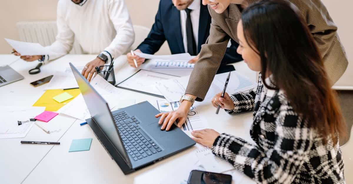 Diverse team working together on a project in a modern office environment.